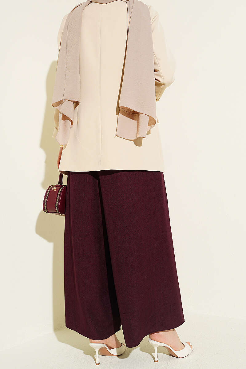 https://cdn.pazarium.com.tr/beli-lastikli-oversize-pacali-pantolon-bordo-763878-18-B.jpg