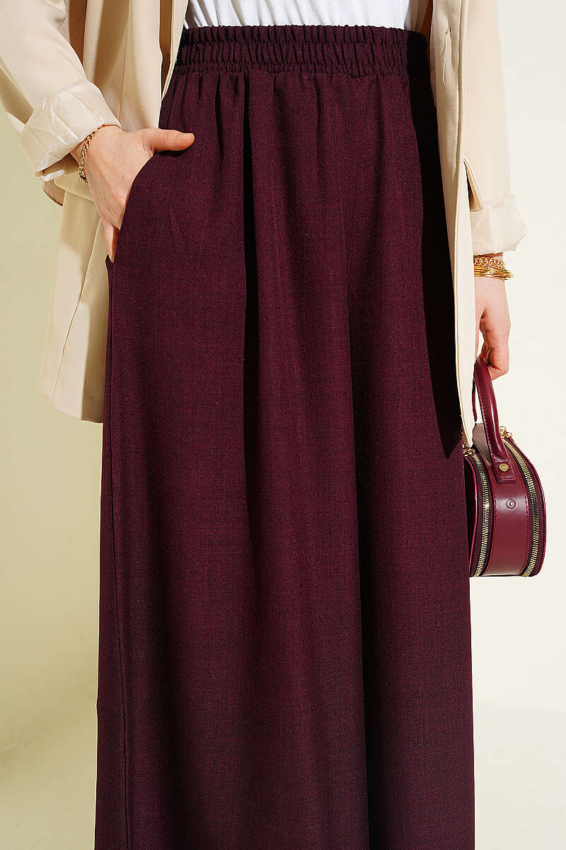 https://cdn.pazarium.com.tr/beli-lastikli-oversize-pacali-pantolon-bordo-763880-18-B.jpg