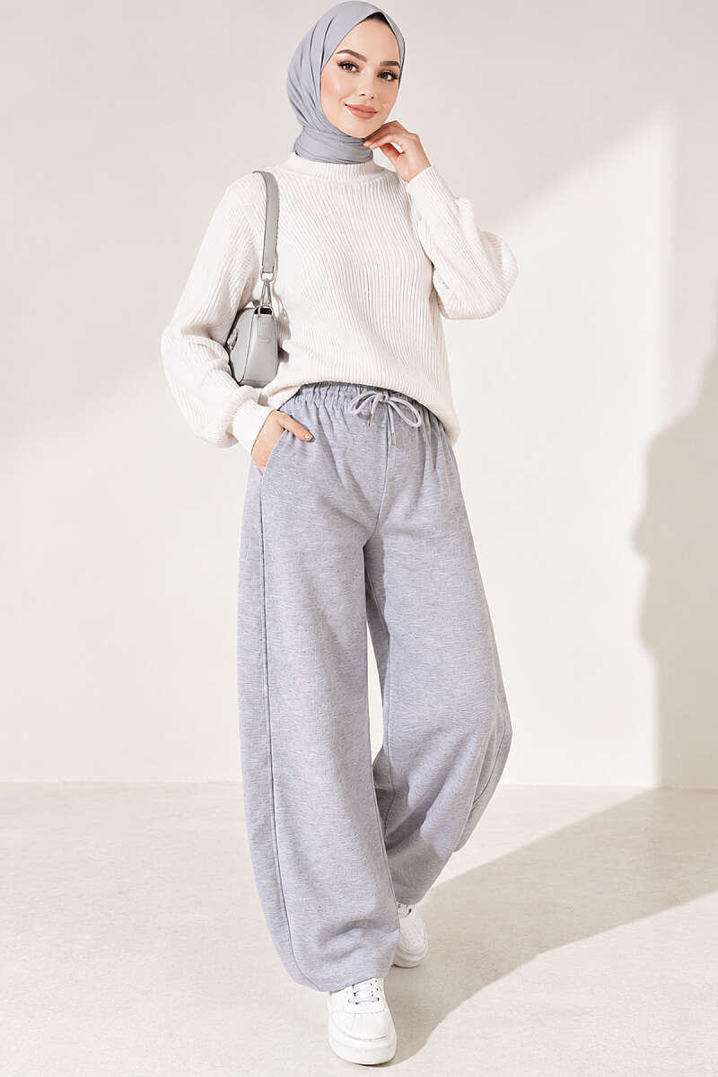 https://cdn.pazarium.com.tr/beli-lastikli-oversize-pantolon-gri-842441-20-B.jpg