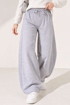 https://cdn.pazarium.com.tr/beli-lastikli-oversize-pantolon-gri-842443-20-B.jpg