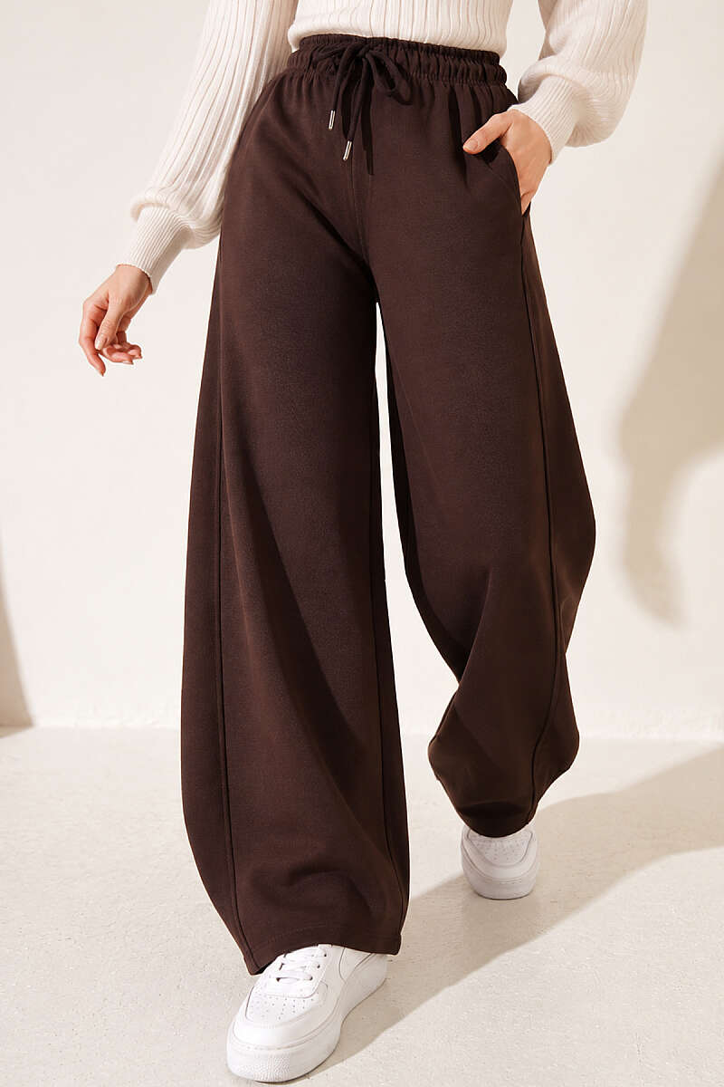 https://cdn.pazarium.com.tr/beli-lastikli-oversize-pantolon-kahve-842436-20-B.jpg