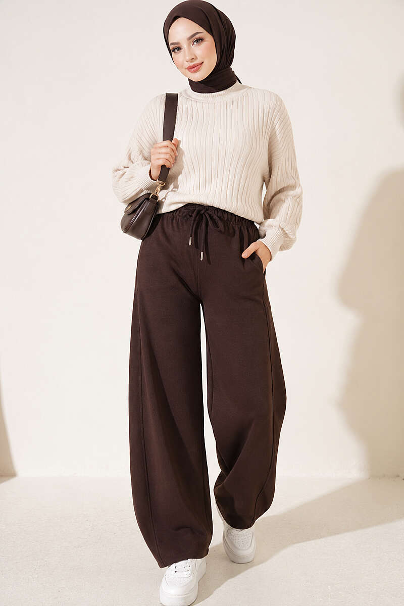 https://cdn.pazarium.com.tr/beli-lastikli-oversize-pantolon-kahve-842437-20-B.jpg