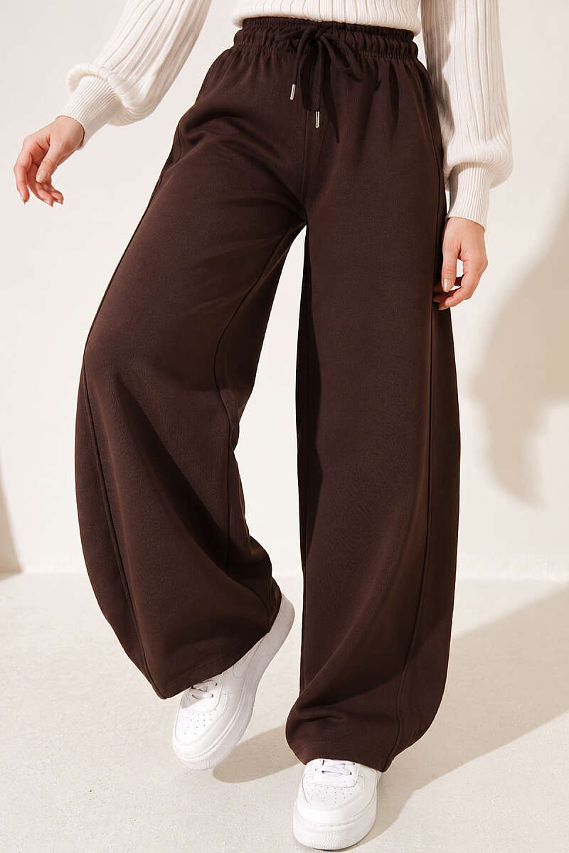 https://cdn.pazarium.com.tr/beli-lastikli-oversize-pantolon-kahve-842439-20-B.jpg