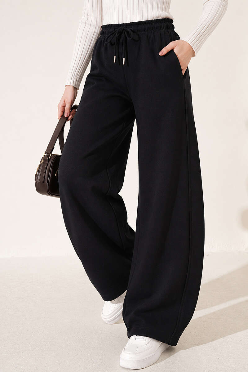 https://cdn.pazarium.com.tr/beli-lastikli-oversize-pantolon-siyah-842428-20-B.jpg