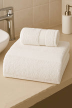 https://cdn.pazarium.com.tr/betus-banyo-havlu-2li-takim-ekru-678041-13-B.jpg