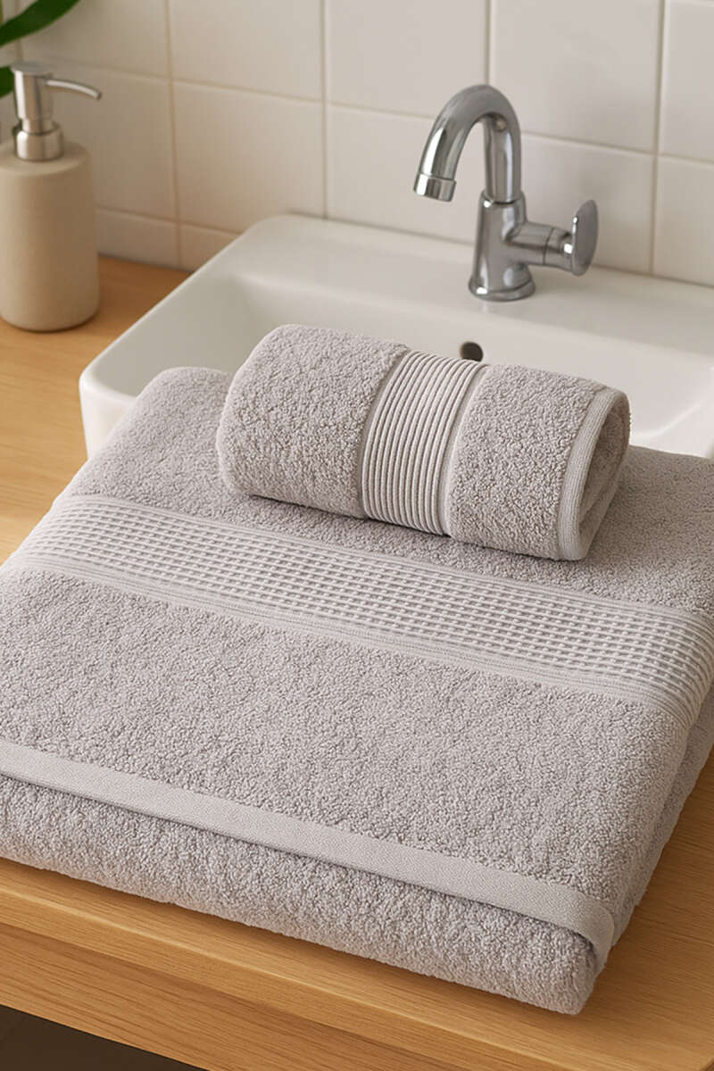 https://cdn.pazarium.com.tr/betus-banyo-havlu-2li-takim-gri-679985-13-B.jpg