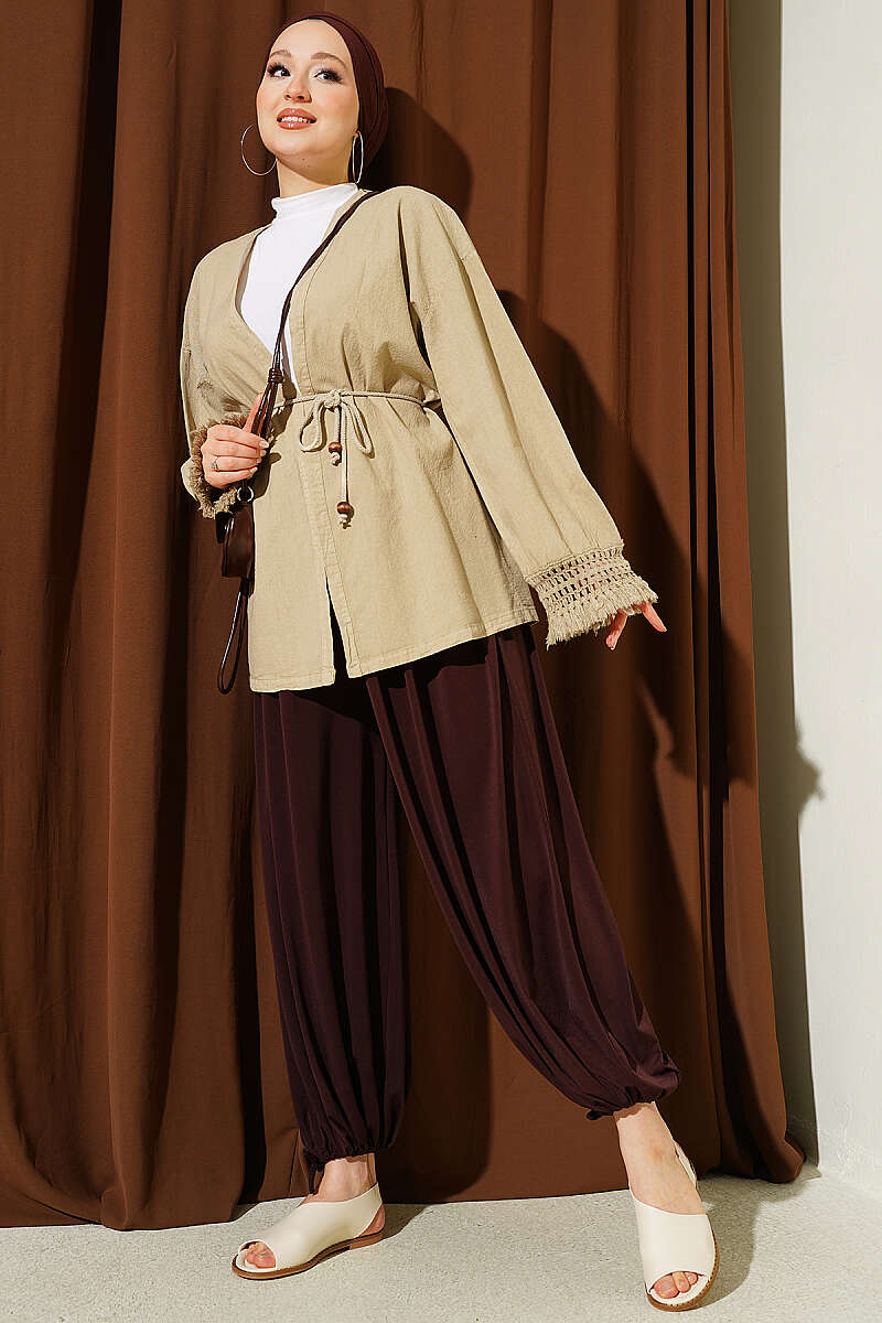 https://cdn.pazarium.com.tr/bilek-puskullu-keten-kimono-bej-799387-19-B.jpg