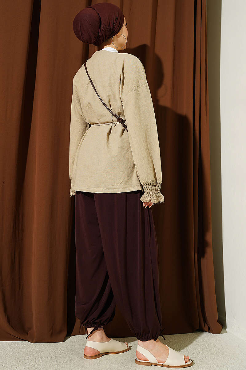 https://cdn.pazarium.com.tr/bilek-puskullu-keten-kimono-bej-799388-19-B.jpg