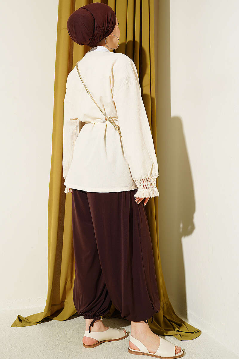 https://cdn.pazarium.com.tr/bilek-puskullu-keten-kimono-krem-799396-19-B.jpg