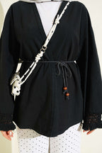 https://cdn.pazarium.com.tr/bilek-puskullu-keten-kimono-siyah-799400-19-B.jpg