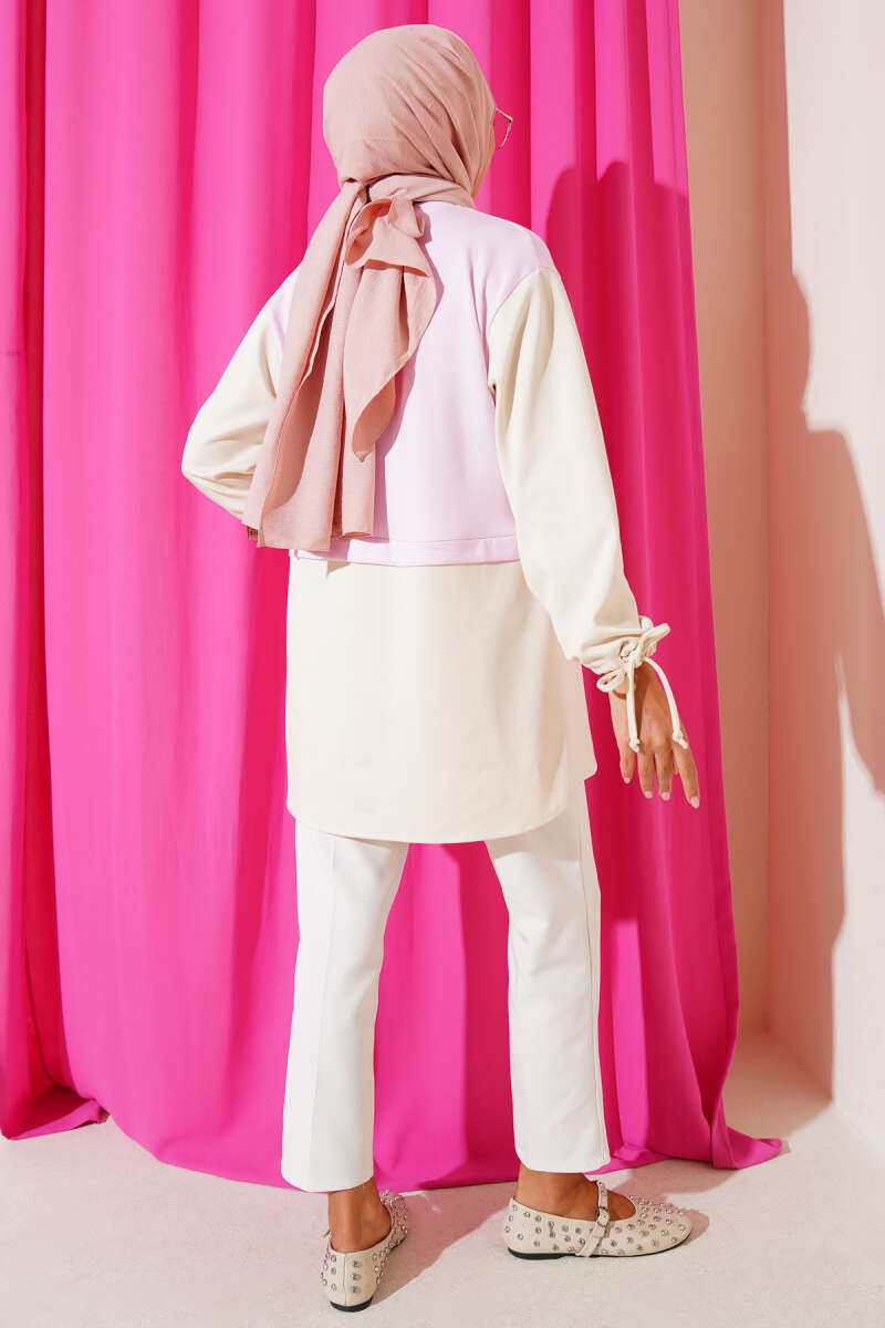 https://cdn.pazarium.com.tr/bilekleri-tunelli-garnili-tunik-pembe-668493-16-B.jpg