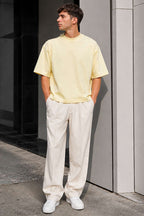 https://cdn.pazarium.com.tr/bisiklet-yaka-basic-oversize-erkek-t-shirt-sari-782519-19-B.jpg