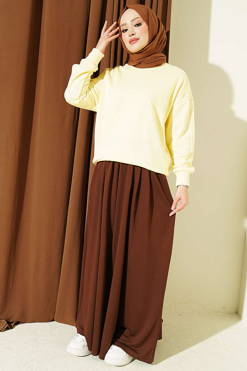 https://cdn.pazarium.com.tr/bisiklet-yaka-basic-tunik-sari-827504-20-B.jpg