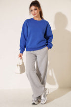 https://cdn.pazarium.com.tr/bisiklet-yaka-basic-uc-iplik-sweatshirt-saks-841639-20-B.jpg