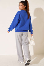 https://cdn.pazarium.com.tr/bisiklet-yaka-basic-uc-iplik-sweatshirt-saks-841641-20-B.jpg