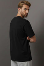 https://cdn.pazarium.com.tr/bisiklet-yaka-erkek-t-shirt-siyah-741270-18-B.jpg