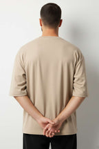 https://cdn.pazarium.com.tr/bisiklet-yaka-fakir-kollu-t-shirt-bej-750389-18-B.jpg