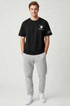 https://cdn.pazarium.com.tr/bisiklet-yaka-nakisli-oversize-t-shirt-siyah-744285-18-B.jpg