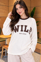 https://cdn.pazarium.com.tr/bisiklet-yaka-wild-baskili-bluz-kahve-835833-20-B.jpg