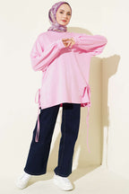 https://cdn.pazarium.com.tr/bisiklet-yaka-yanlari-ip-baglamali-tunik-pembe-756264-18-B.jpg