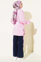 https://cdn.pazarium.com.tr/bisiklet-yaka-yanlari-ip-baglamali-tunik-pembe-756265-18-B.jpg