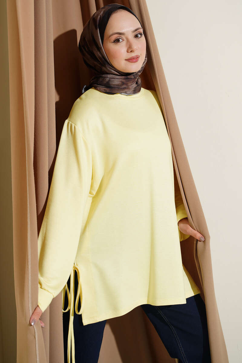 https://cdn.pazarium.com.tr/bisiklet-yaka-yanlari-ip-baglamali-tunik-sari-756266-18-B.jpg