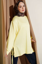 https://cdn.pazarium.com.tr/bisiklet-yaka-yanlari-ip-baglamali-tunik-sari-756266-18-B.jpg