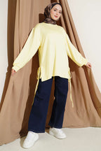 https://cdn.pazarium.com.tr/bisiklet-yaka-yanlari-ip-baglamali-tunik-sari-756268-18-B.jpg