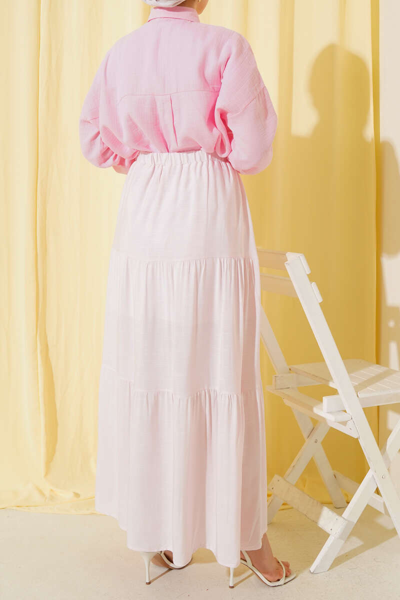 https://cdn.pazarium.com.tr/boncuk-ip-detayli-etek-pembe-652412-15-B.jpg