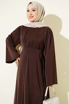 https://cdn.pazarium.com.tr/boncuk-islemeli-kusakli-abaya-809131-20-B.jpg