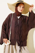 https://cdn.pazarium.com.tr/brit-dugmeli-oversize-kimono-kahve-804591-19-B.jpg