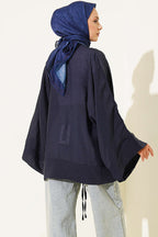 https://cdn.pazarium.com.tr/brit-dugmeli-oversize-kimono-lacivert-804588-19-B.jpg