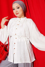 https://cdn.pazarium.com.tr/brit-dugmeli-oversize-muslin-gomlek-ekru-810919-20-B.jpg