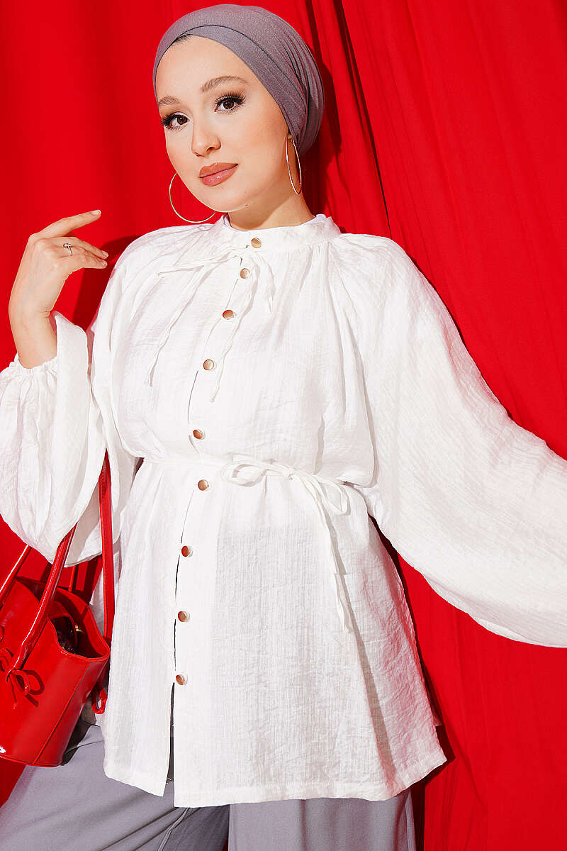 https://cdn.pazarium.com.tr/brit-dugmeli-oversize-muslin-gomlek-ekru-810919-20-B.jpg