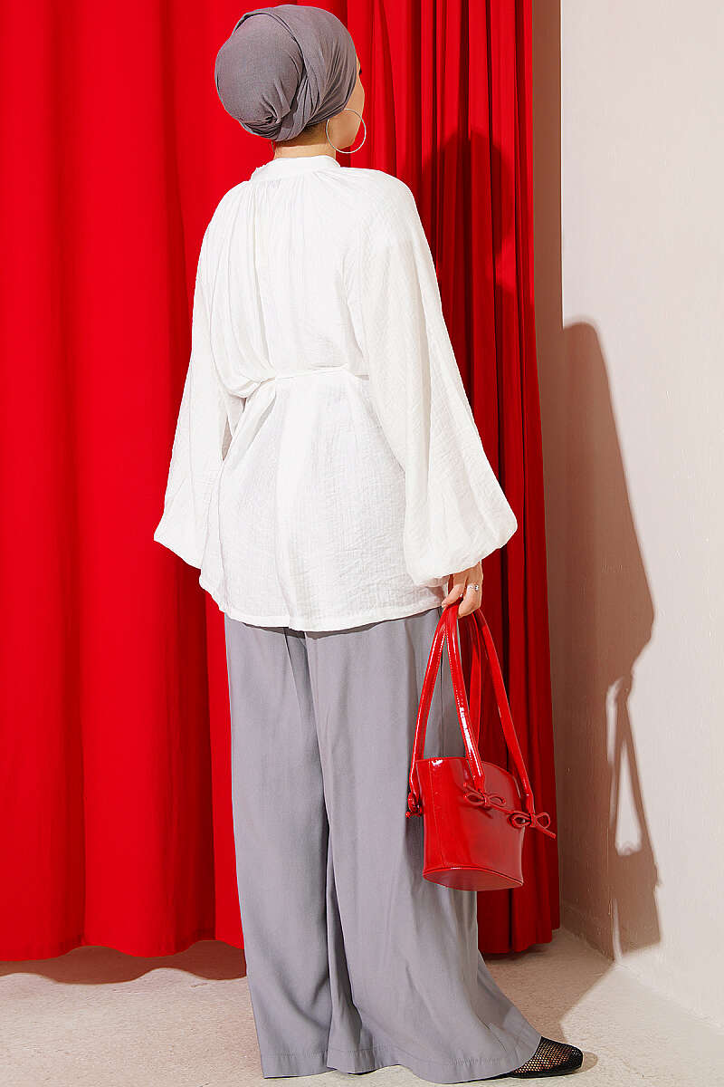 https://cdn.pazarium.com.tr/brit-dugmeli-oversize-muslin-gomlek-ekru-810921-20-B.jpg