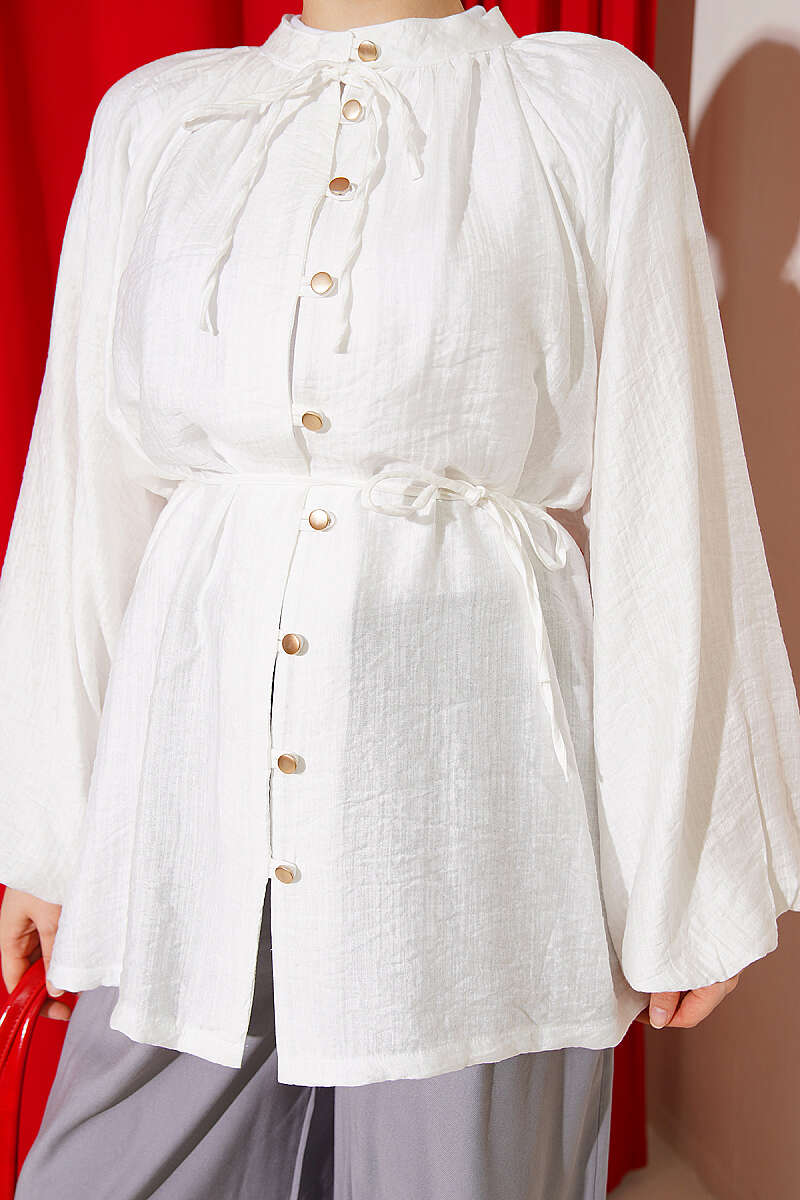 https://cdn.pazarium.com.tr/brit-dugmeli-oversize-muslin-gomlek-ekru-810922-20-B.jpg