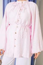 https://cdn.pazarium.com.tr/brit-dugmeli-oversize-muslin-gomlek-pembe-810930-20-B.jpg