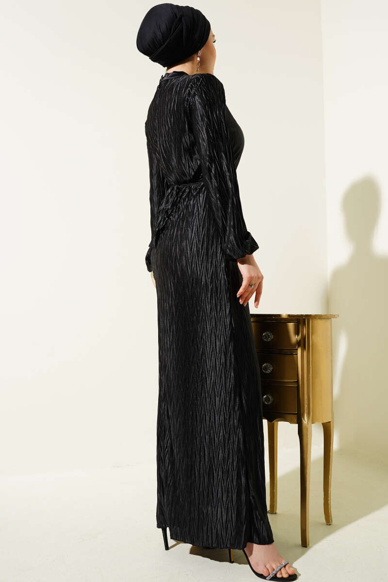 https://cdn.pazarium.com.tr/buzgu-piliseli-kusakli-elbise-siyah-591626-14-B.jpg