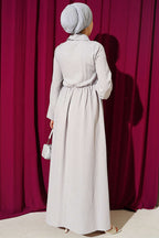 https://cdn.pazarium.com.tr/capraz-gogus-parcali-elbise-tas-807959-19-B.jpg