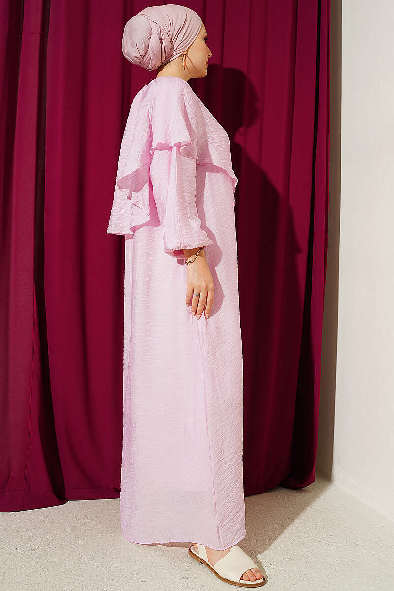 https://cdn.pazarium.com.tr/capraz-omuz-pelerinli-elbise-pembe-799595-19-B.jpg
