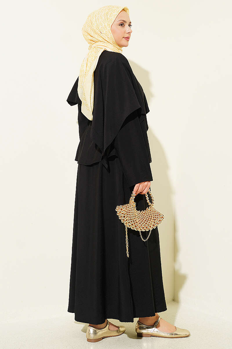 https://cdn.pazarium.com.tr/capraz-omuz-pelerinli-etekli-ikili-takim-siyah-797763-19-B.jpg