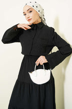 https://cdn.pazarium.com.tr/cep-ve-bilek-brodeli-krinkil-etekli-takim-siyah-768066-18-B.jpg