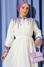 https://cdn.pazarium.com.tr/cicek-baskili-brit-dugmeli-sifon-elbise-ekru-798210-19-B.jpg
