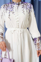 https://cdn.pazarium.com.tr/cicek-baskili-brit-dugmeli-sifon-elbise-ekru-798213-19-B.jpg