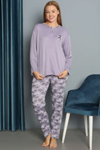 https://cdn.pazarium.com.tr/cicek-desenli-fitilli-pijama-takimi-lila-680325-16-B.jpg