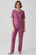 https://cdn.pazarium.com.tr/cicek-detayli-dugmeli-kisa-kol-pijama-takimi-magenta-768507-18-B.jpg