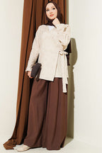 https://cdn.pazarium.com.tr/cicek-islemeli-baglamali-kimono-bej-793672-19-B.jpg