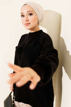 https://cdn.pazarium.com.tr/cicek-islemeli-triko-kazak-siyah-688704-16-B.jpg