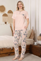 https://cdn.pazarium.com.tr/cicek-nakisli-kisa-kol-pijama-takimi-yavru-agzi-745855-18-B.jpg