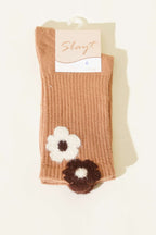 https://cdn.pazarium.com.tr/cicek-sakal-detayli-kadin-soket-corap-latte-707923-17-B.jpg